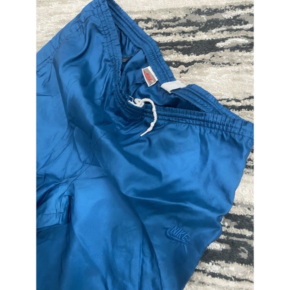 VINTAGE Nike Pants Mens M‎ Blue Windbreaker Jogger Nylon Swoosh 90s 80s - Picture 1 of 9